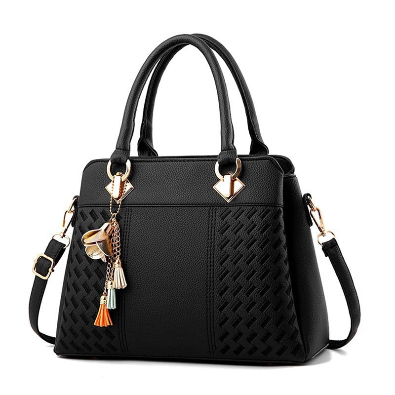 large PU tote with tassel detail