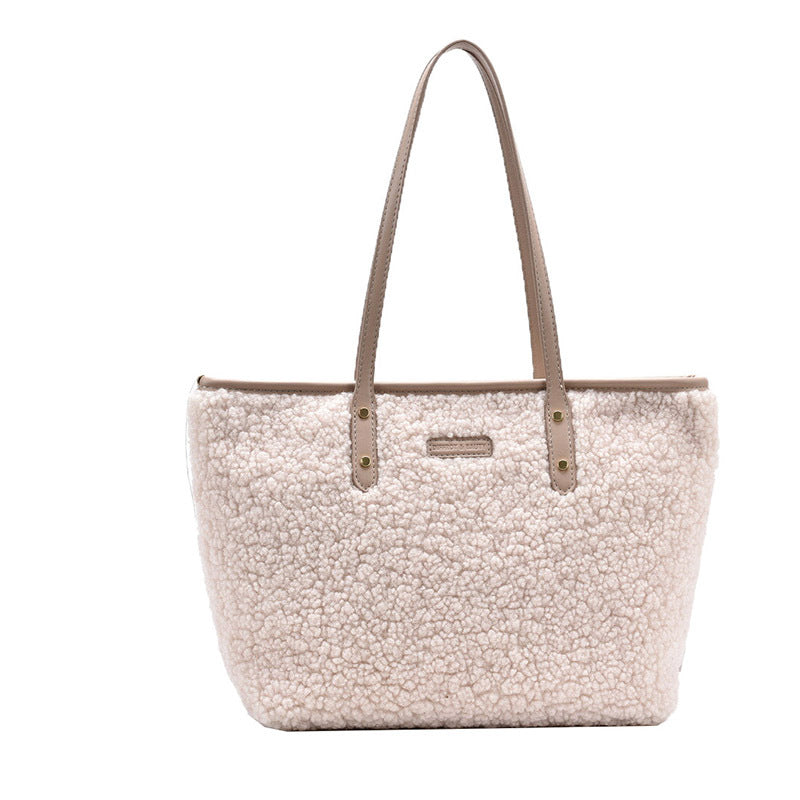 large lambskin-style tote bag with zipper and pockets