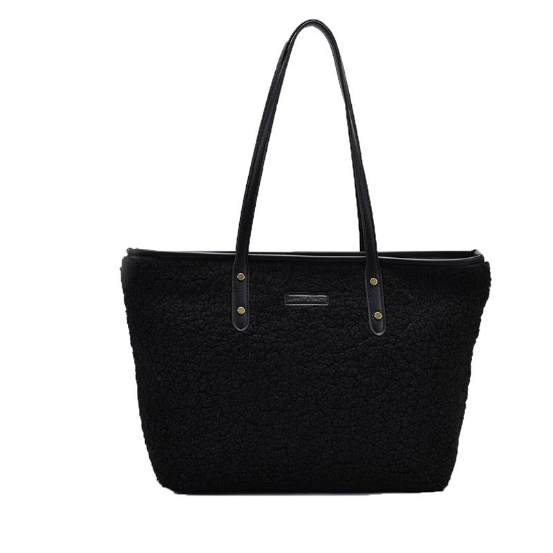 large lambskin-style tote bag with zipper and pockets