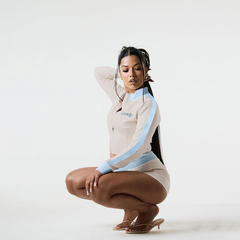 Stand-collar top with embroidery and matching shorts