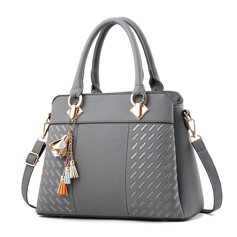 large PU tote with tassel detail
