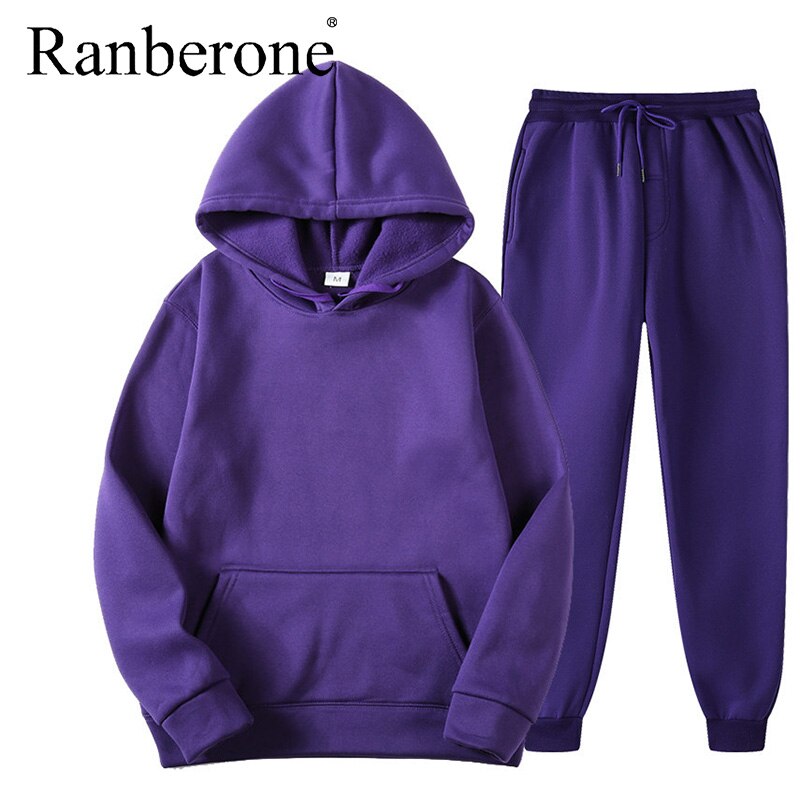 Solid color hooded sweatshirt and matching pants set