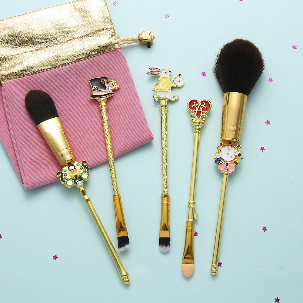 five makeup brushes with flannel bag
