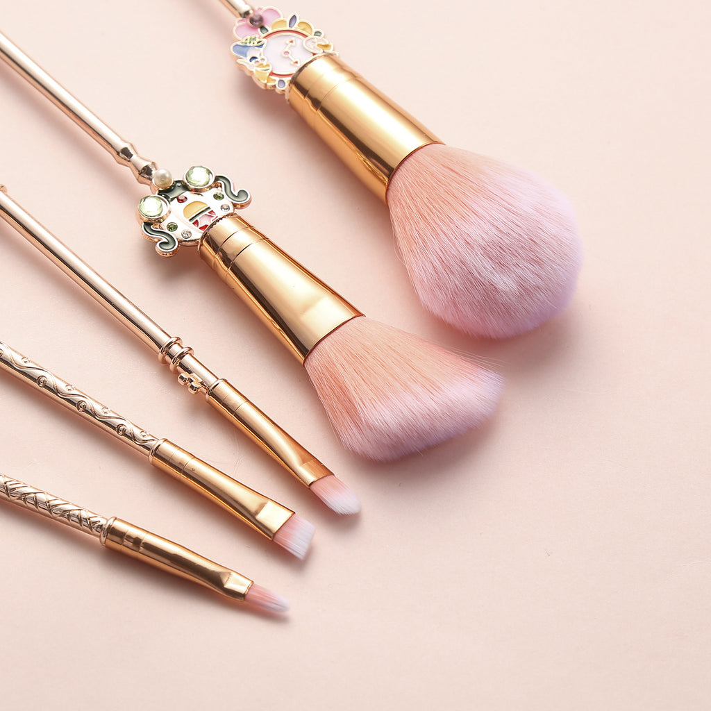 five makeup brushes with flannel bag