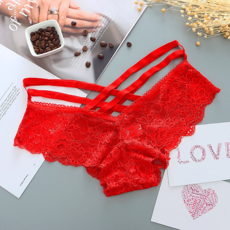 low-rise lace thong with cross straps