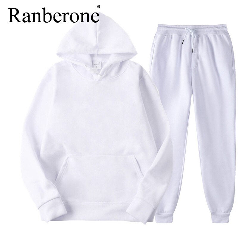 Solid color hooded sweatshirt and matching pants set
