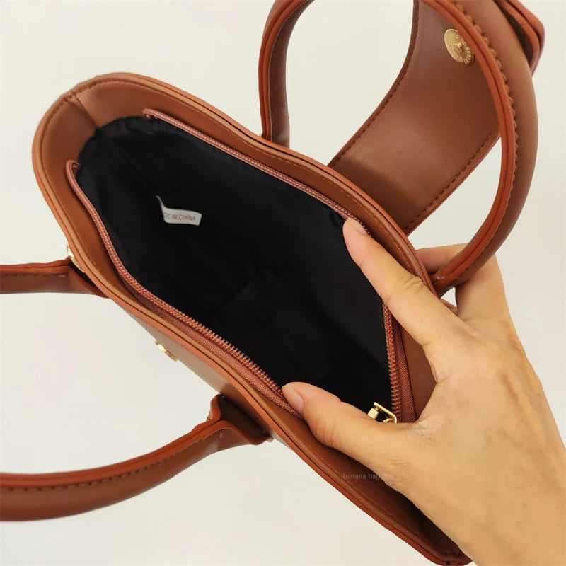 vintage shell top-handle PU bag