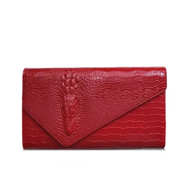 Red textured clutch bag