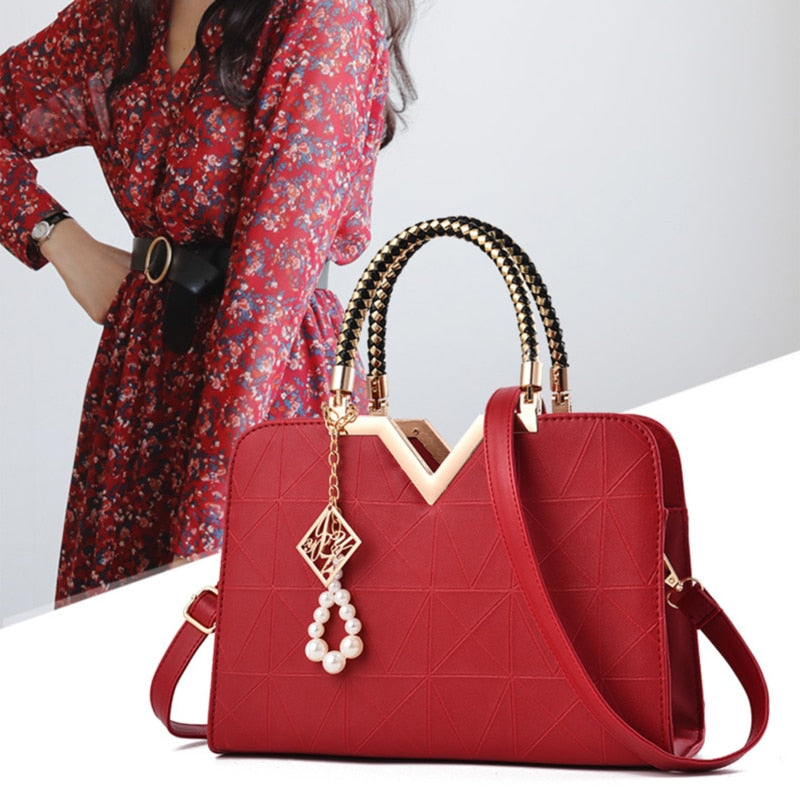 embroidered PU top-handle tote bag