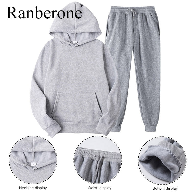 Solid color hooded sweatshirt and matching pants set
