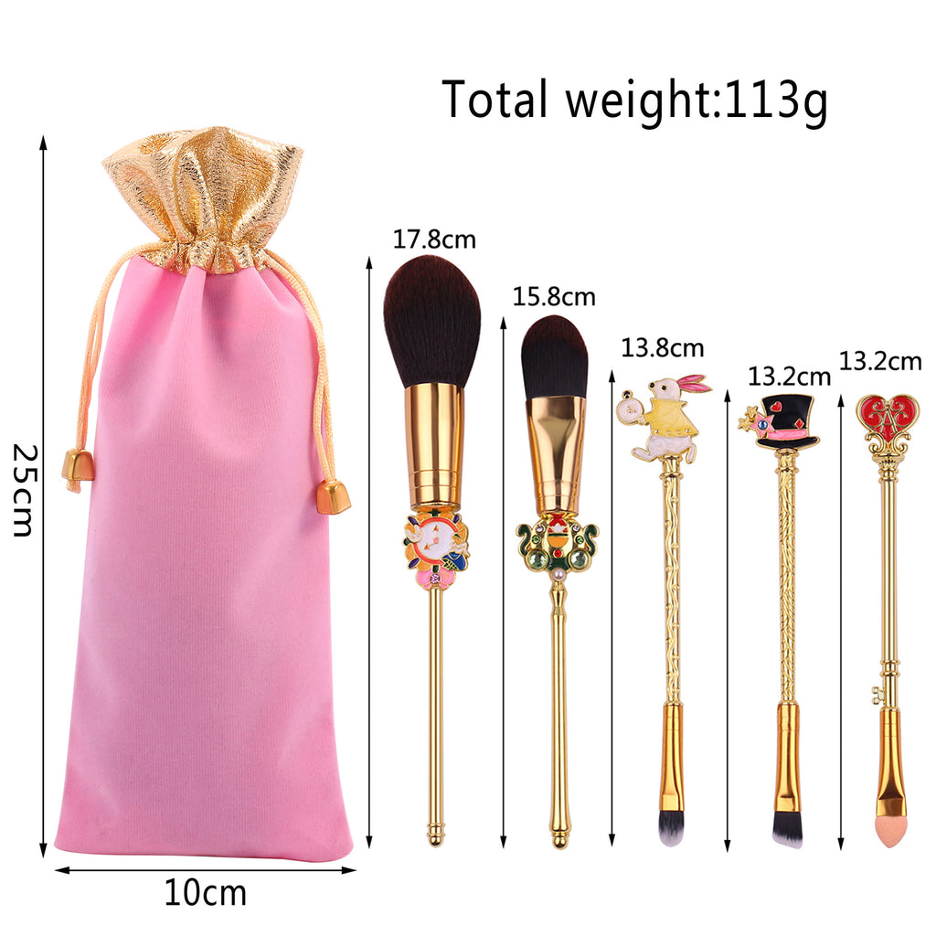 five makeup brushes with flannel bag