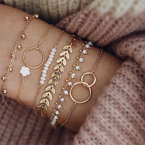 Gold-tone bohemian bracelet with tassel accents