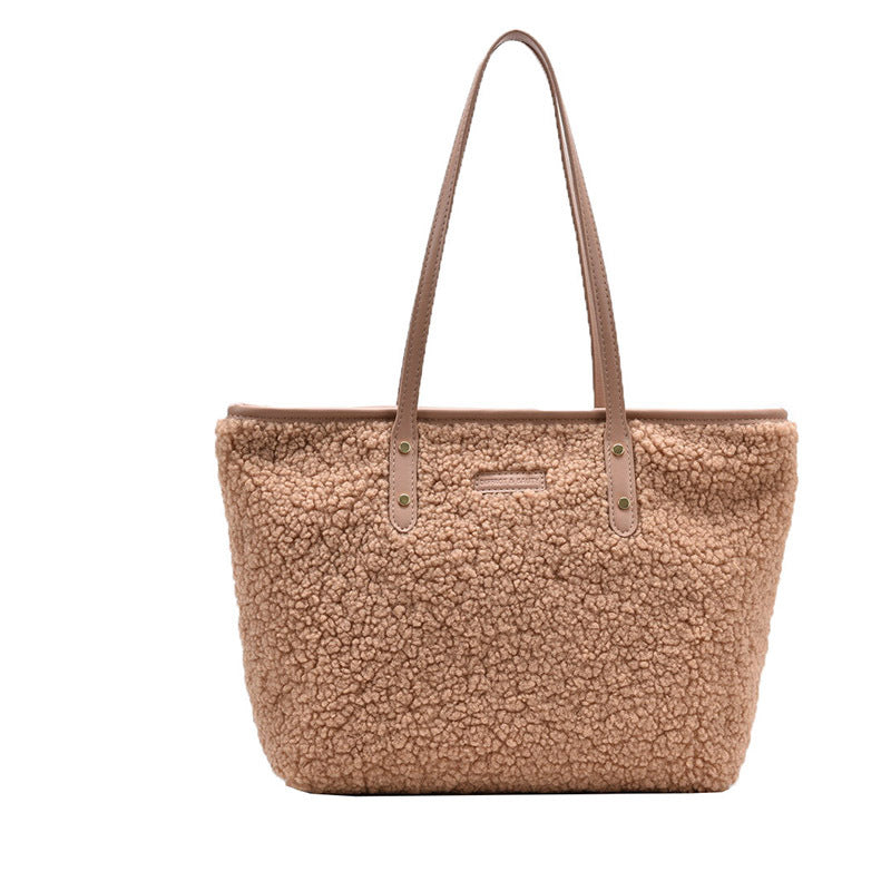 large lambskin-style tote bag with zipper and pockets