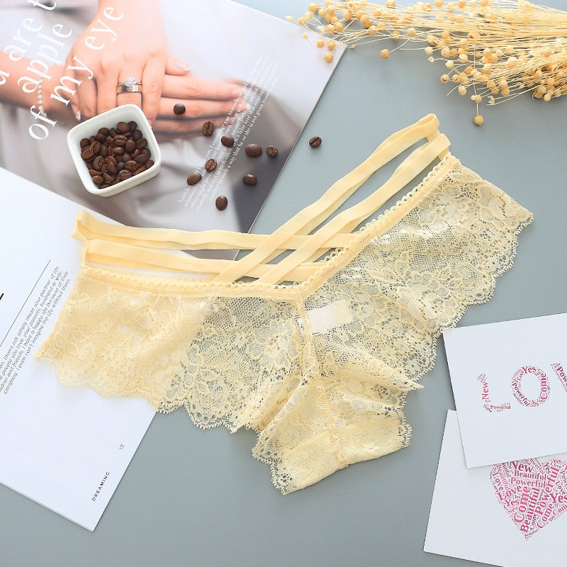 low-rise lace thong with cross straps