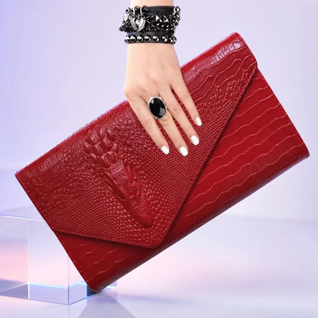 Red textured clutch bag